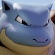 A screenshot of Blastoise smiling just before it rekts some opposing Pokémon.